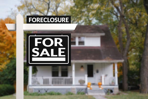 Repossessed homes are sold through a real estate broker